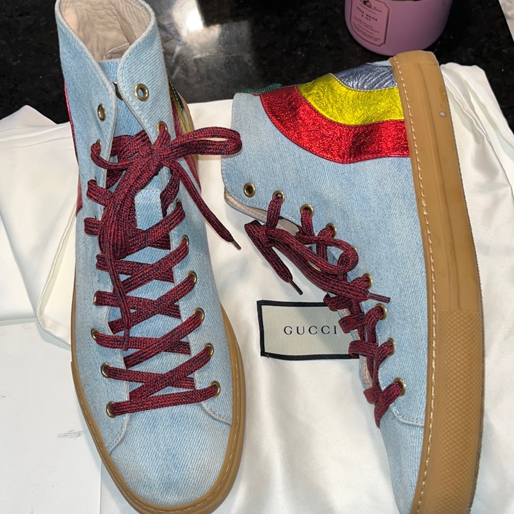 Very well used and clean Gucci sneakers with cloths and boxes. Clean and rare